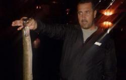 Mićan Ignjatić ulovio jegulju kapitalca u Trebišnjici