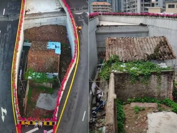 Направили ауто-пут око куће, али власница и даље одбија да је прода (ВИДЕО)