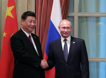 Ђинпинг почиње посјету Москви; Састанак са Путином